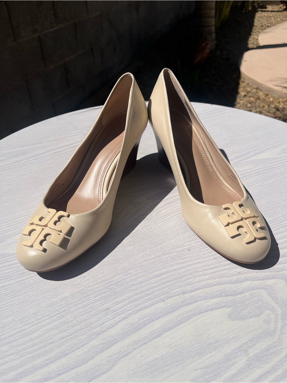 Tory Burch Cream Leather Wedge Pumps with Logo Medallion